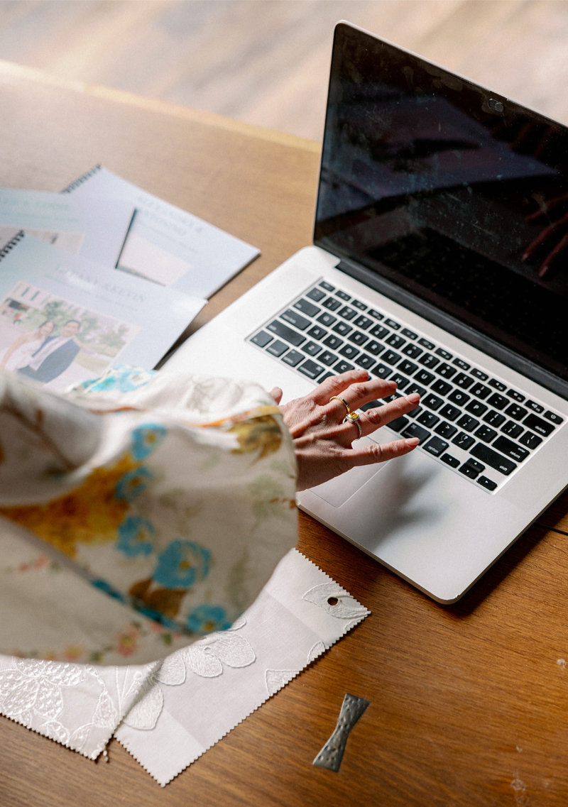Desirée Adams reached for her laptop as she starts to type a script about email marketing for wedding planners.