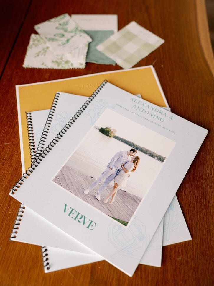 Verve Event Co. wedding planning binder and flatlay of items for design - a perfect representation of how to become a preferred vendor by being organized.